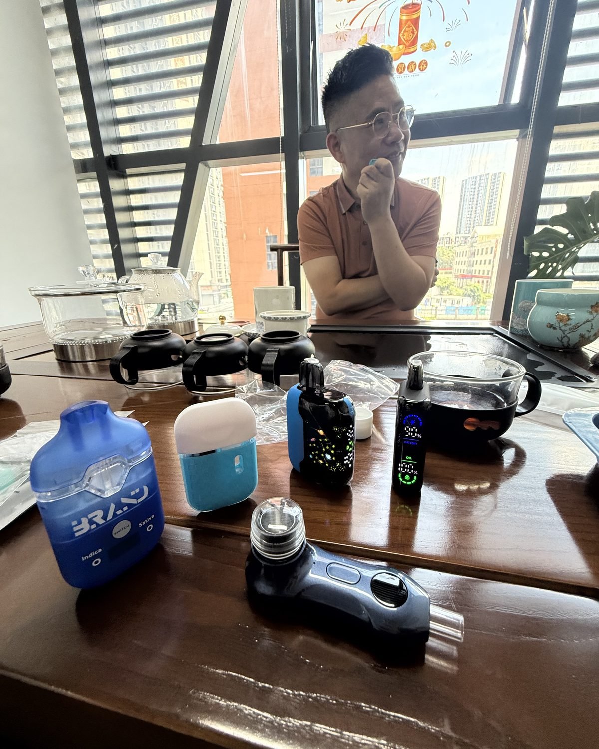 Reviewing hardware samples with a factory owner in Shenzhen